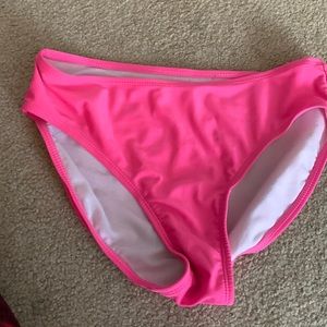 Hot pink kids swim bottoms.